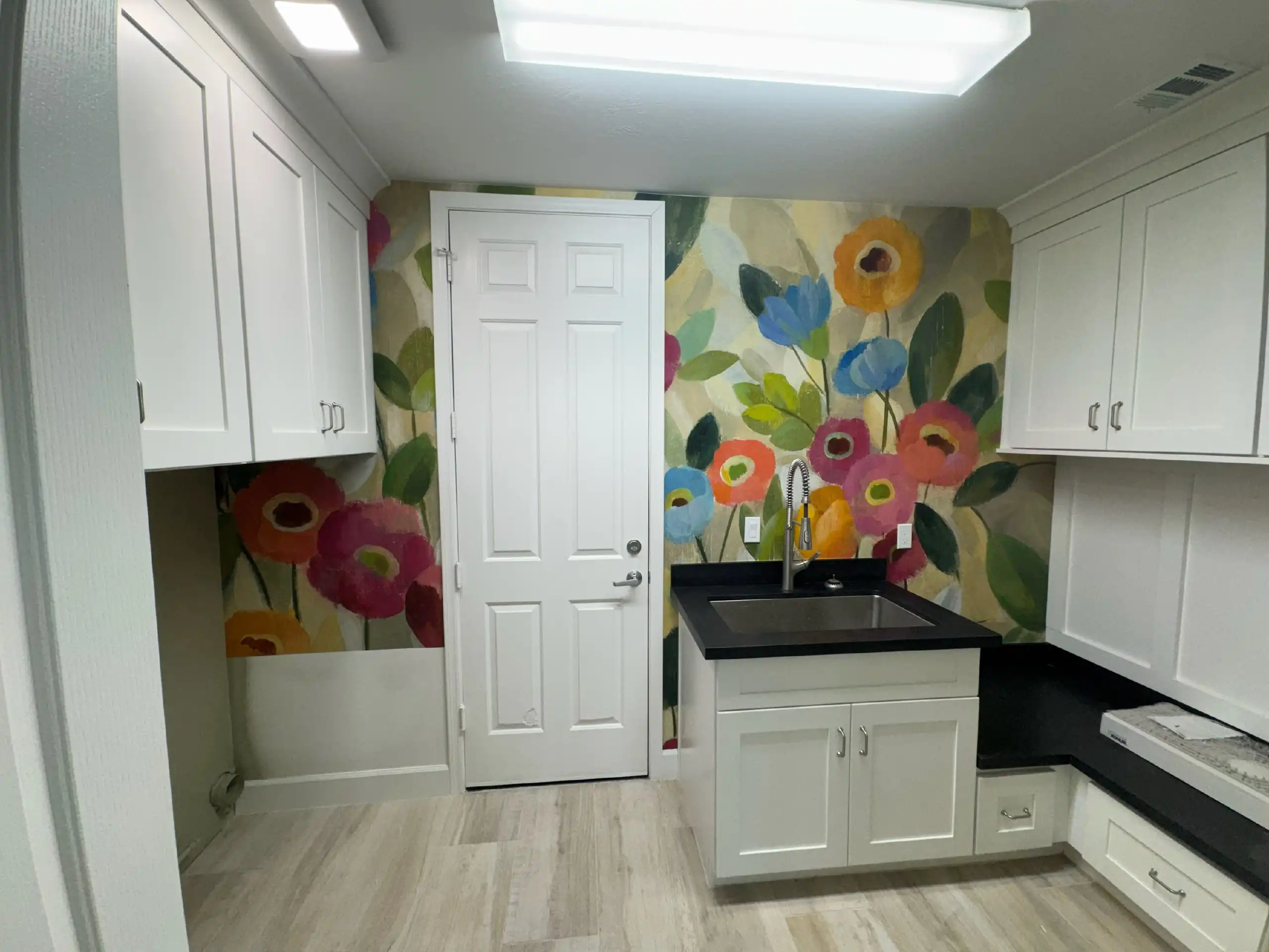 Colorful floral wallcovering on a kitchen wall